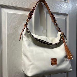 No tags but new never used large Dooney Bourke whit Wallet